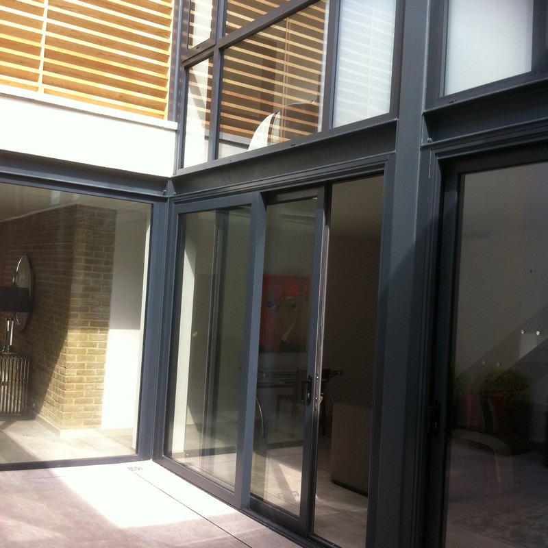 Anthracite aluminium sliding patio doors fitted in Olympic Park